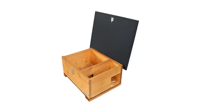 Internal layout Product shot of the wooden hedgehog house with the lid propped open, revealing the internal structure and compartment layout.