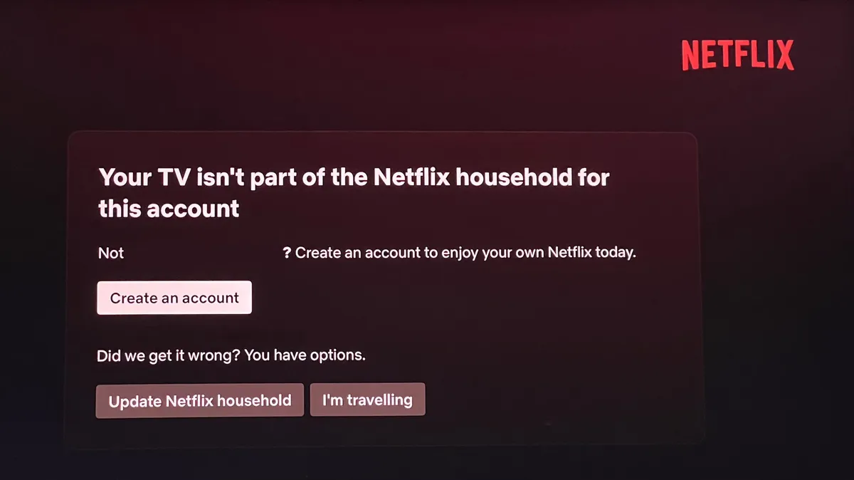 A TV screen reads in part: NETFLIX Your TV isn't part of the Netflix household for this account Not [redacted]? Create an account to enjoy your own Netflix today.