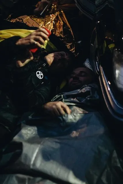 Two people have chained themselves to the underside of a herse in Trafalgar Square
