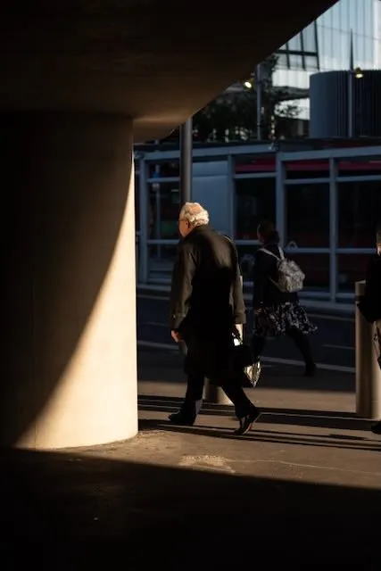 A man takes a walk in the evening