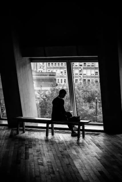 A man sits on a bench