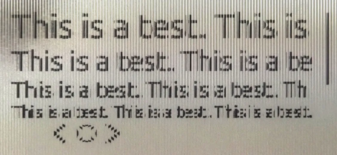 A macro photo of the image, printed on paper and viewed through a lenticular sheet.