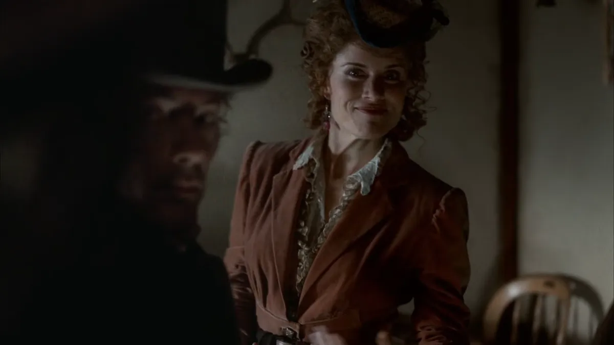 Joanie shot through a crowd of people in the restaurant.