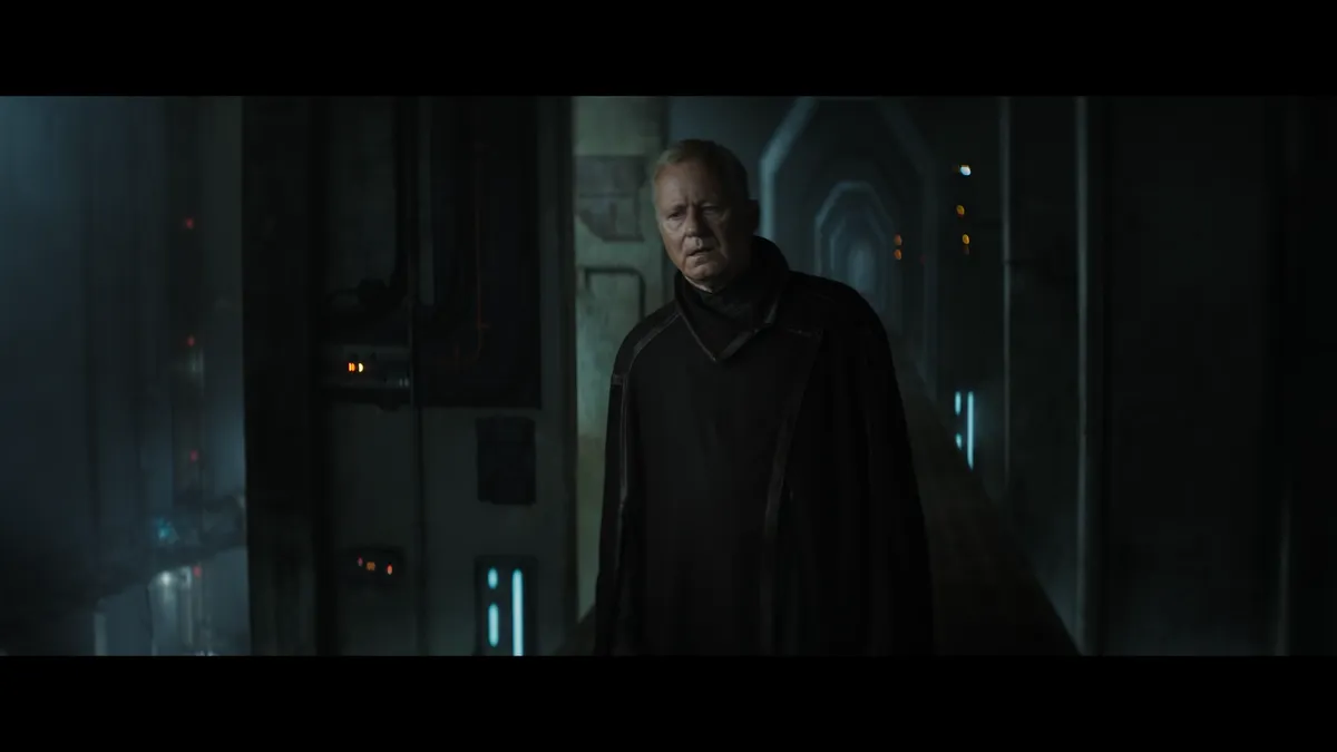 Luthen standing in a Coruscant maintenance tunnel.