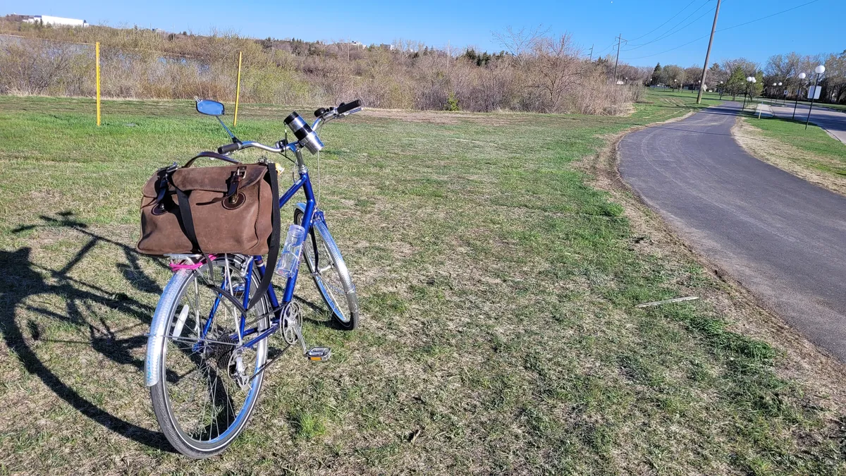 A bicycle near a path