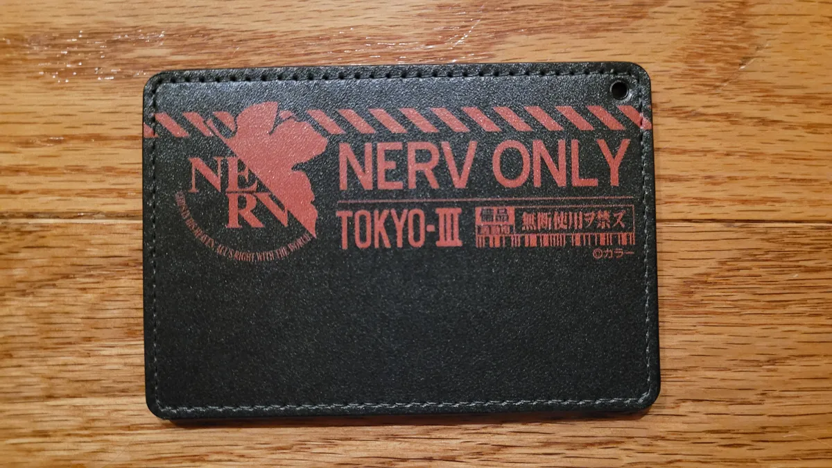 A card holder featuring NERV ONLY and NERV log from Evangelion