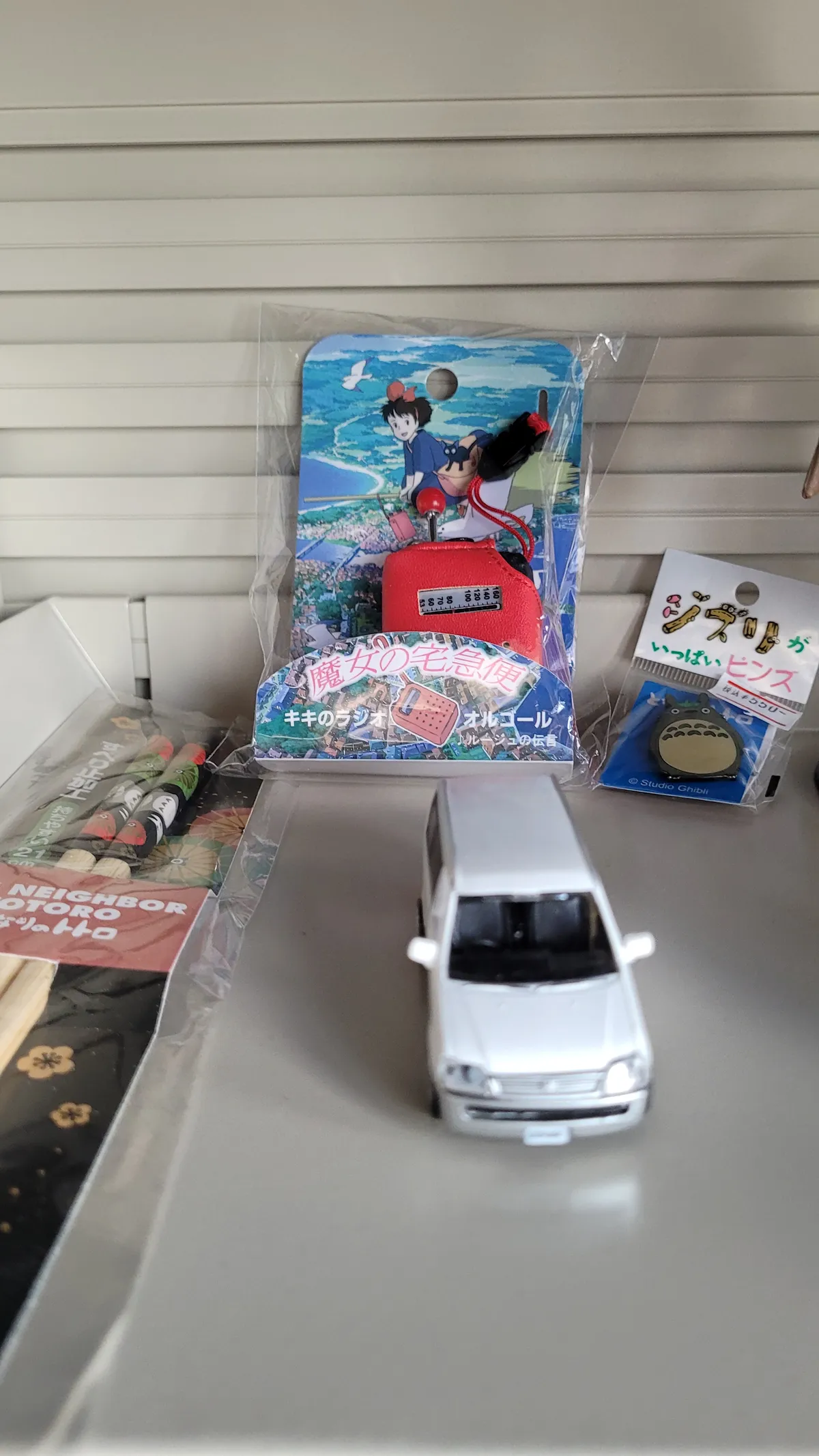Some Japanese collectables on a shelf