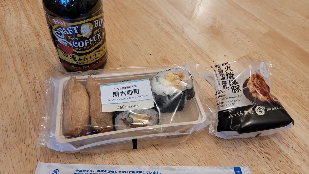 Hot bottled coffee and packaged sushi and onigiri