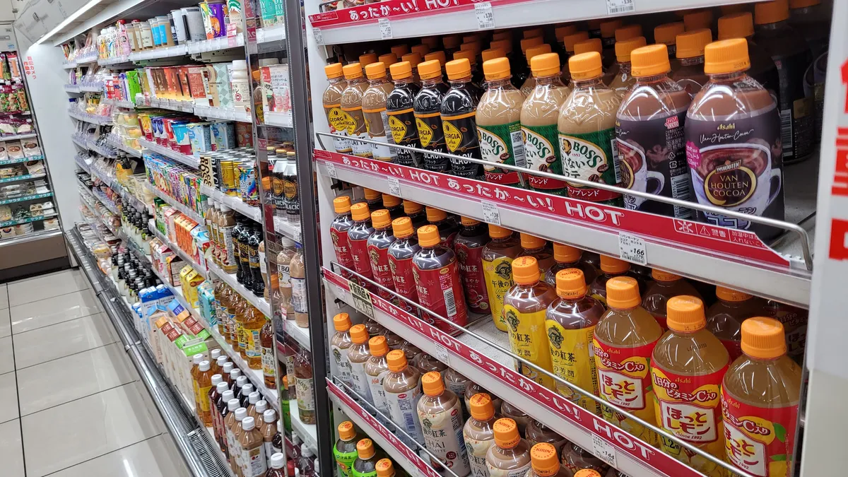 Hot bottled beverages on shelves