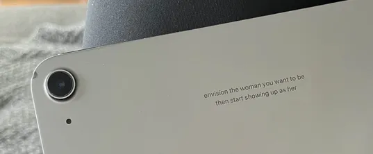 envision the woman you want to be, then start showing up as her