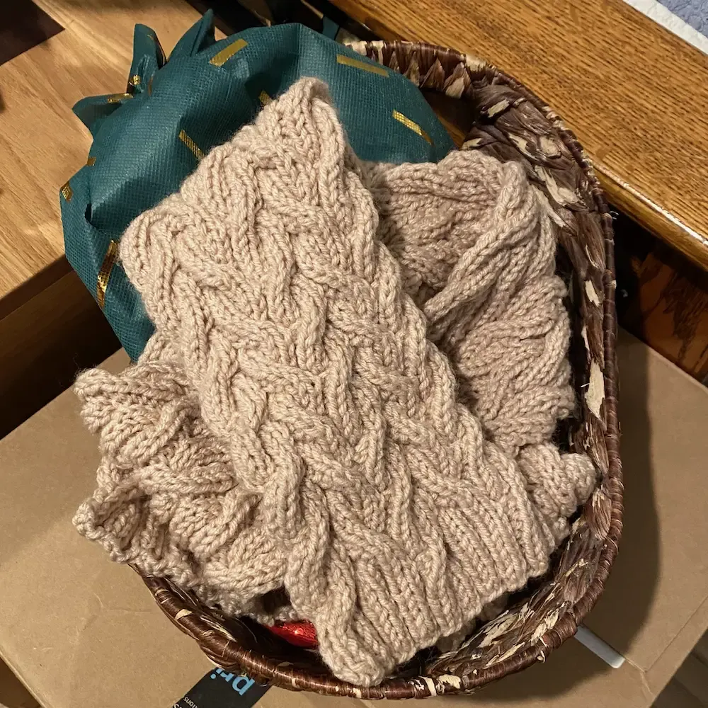 Mary's Meadow Vine scarf in a basket.
