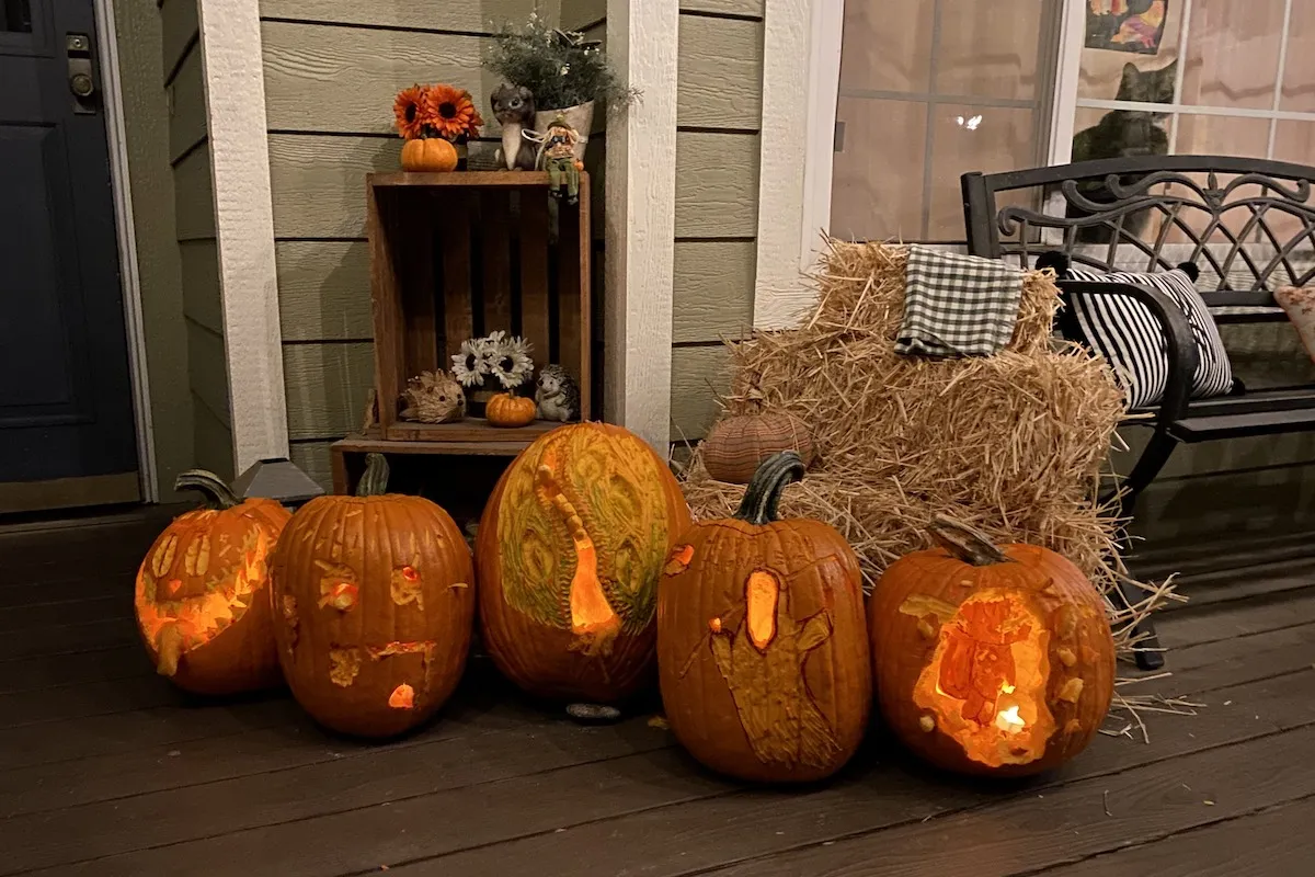 Sterling admires the kids' pumpkin-carving handiwork from the living room window.