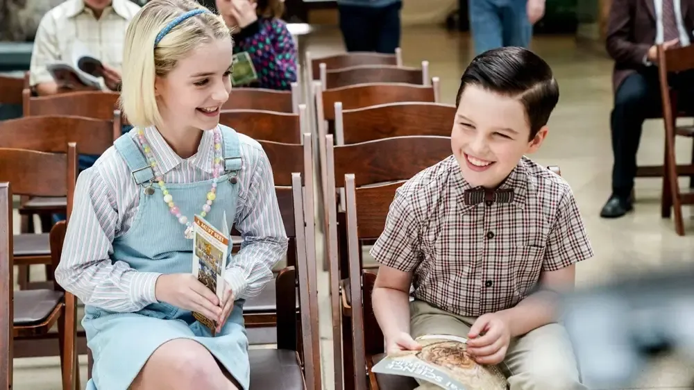 Paige and Sheldon share a laugh.