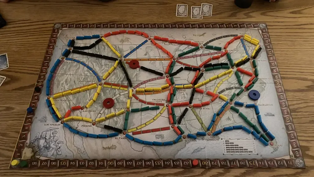 Final board state for our Ticket to Ride. (some colors are missing trains)