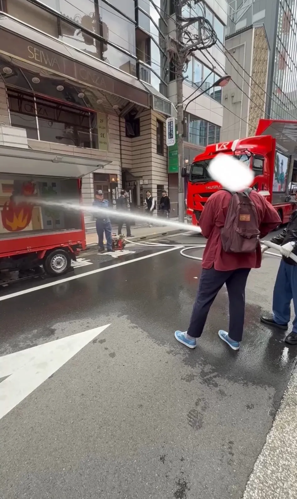 me, shooting a fire hose