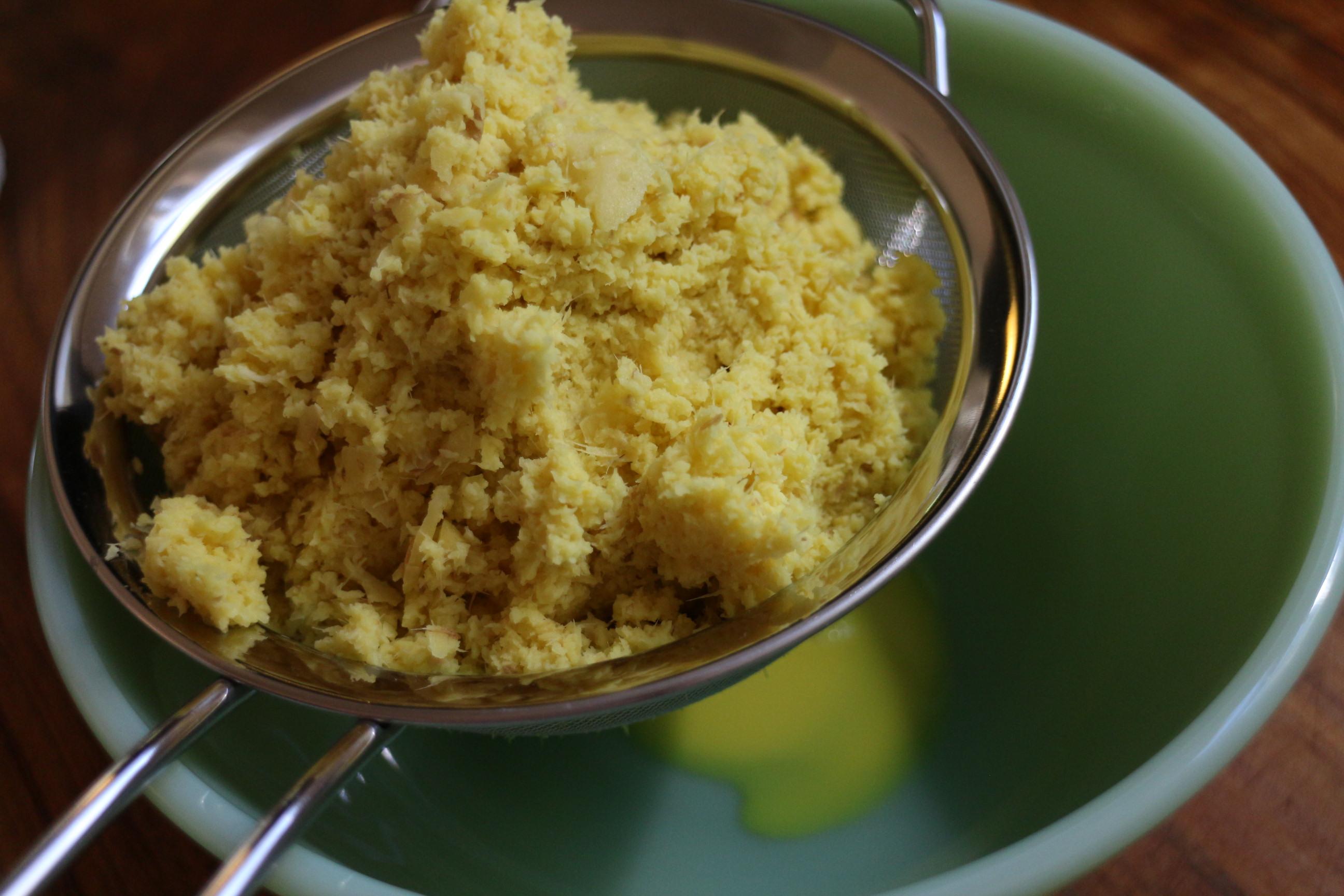 straining ginger