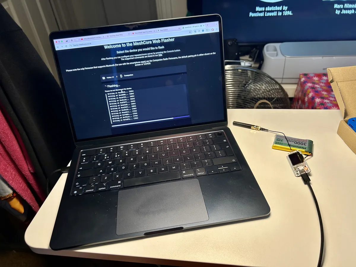 A MacBook flashing a Heltec v3 board