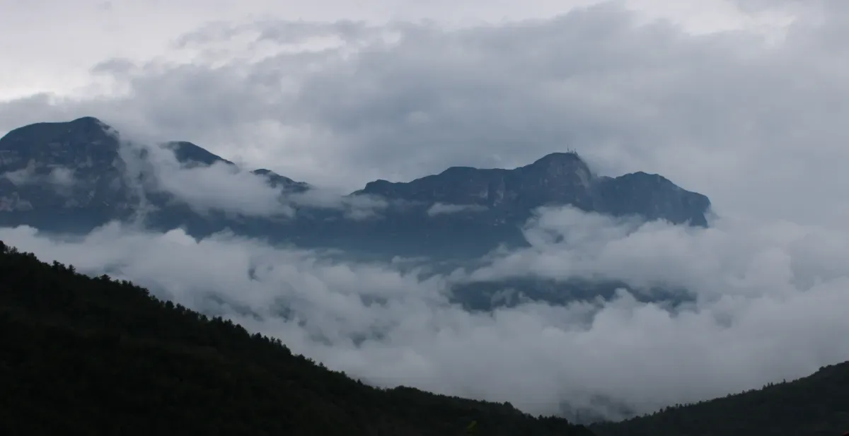 A cloud shrouded Mount Paganella near Trento Italy