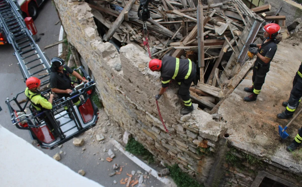 Italian Firemen on a roof