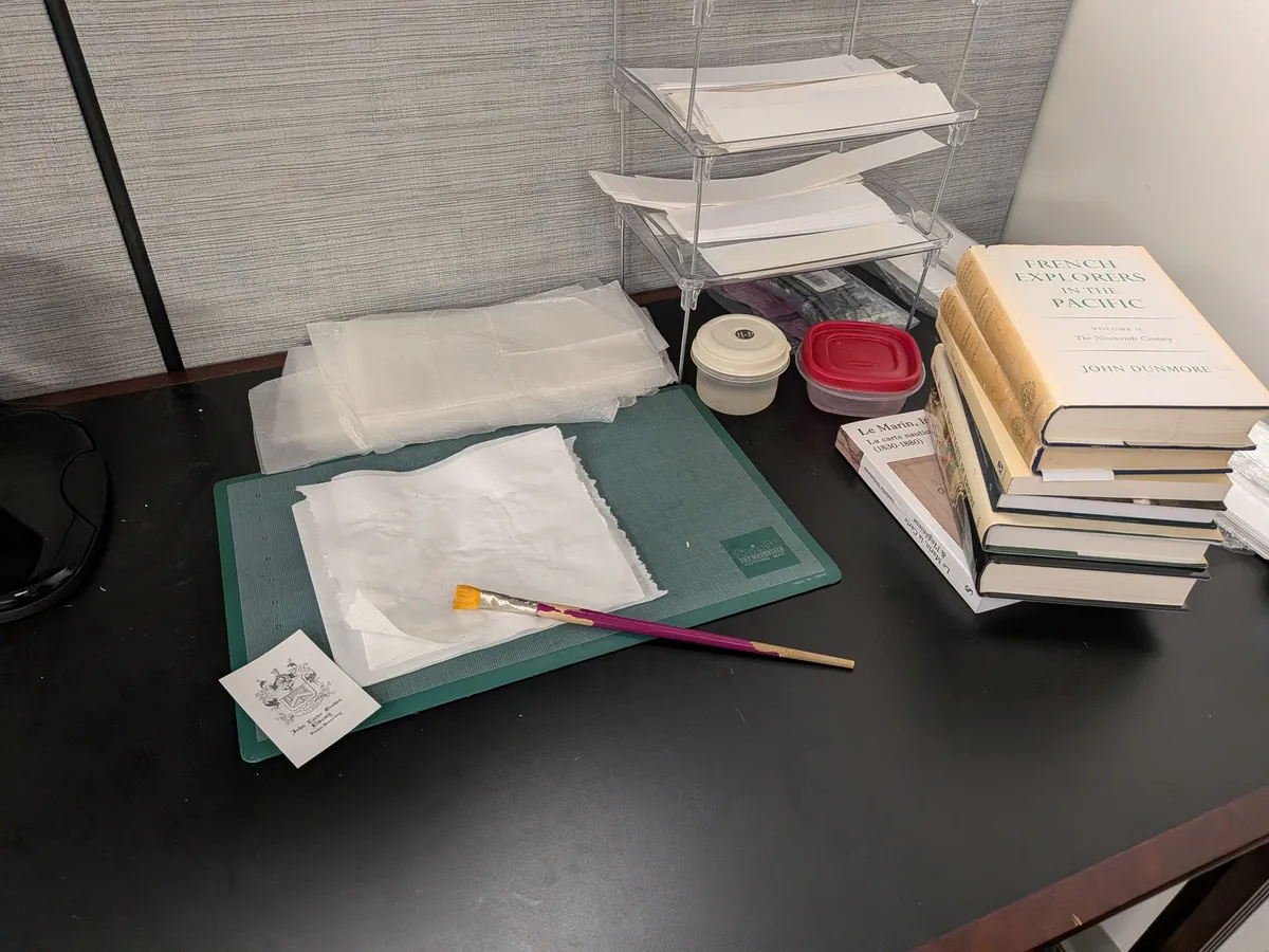 Book plating station