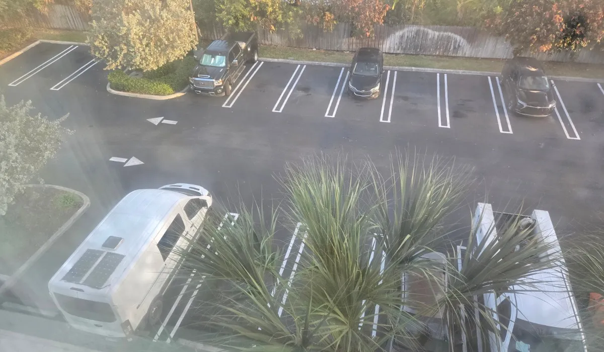 My van in the hotel parking lot below March 2026