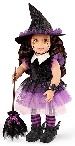 an Our Generation brand doll in an purple and black witch costume, holding a matching broom