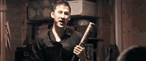 Markiplier as "The Author," being menacing with a baseball bat