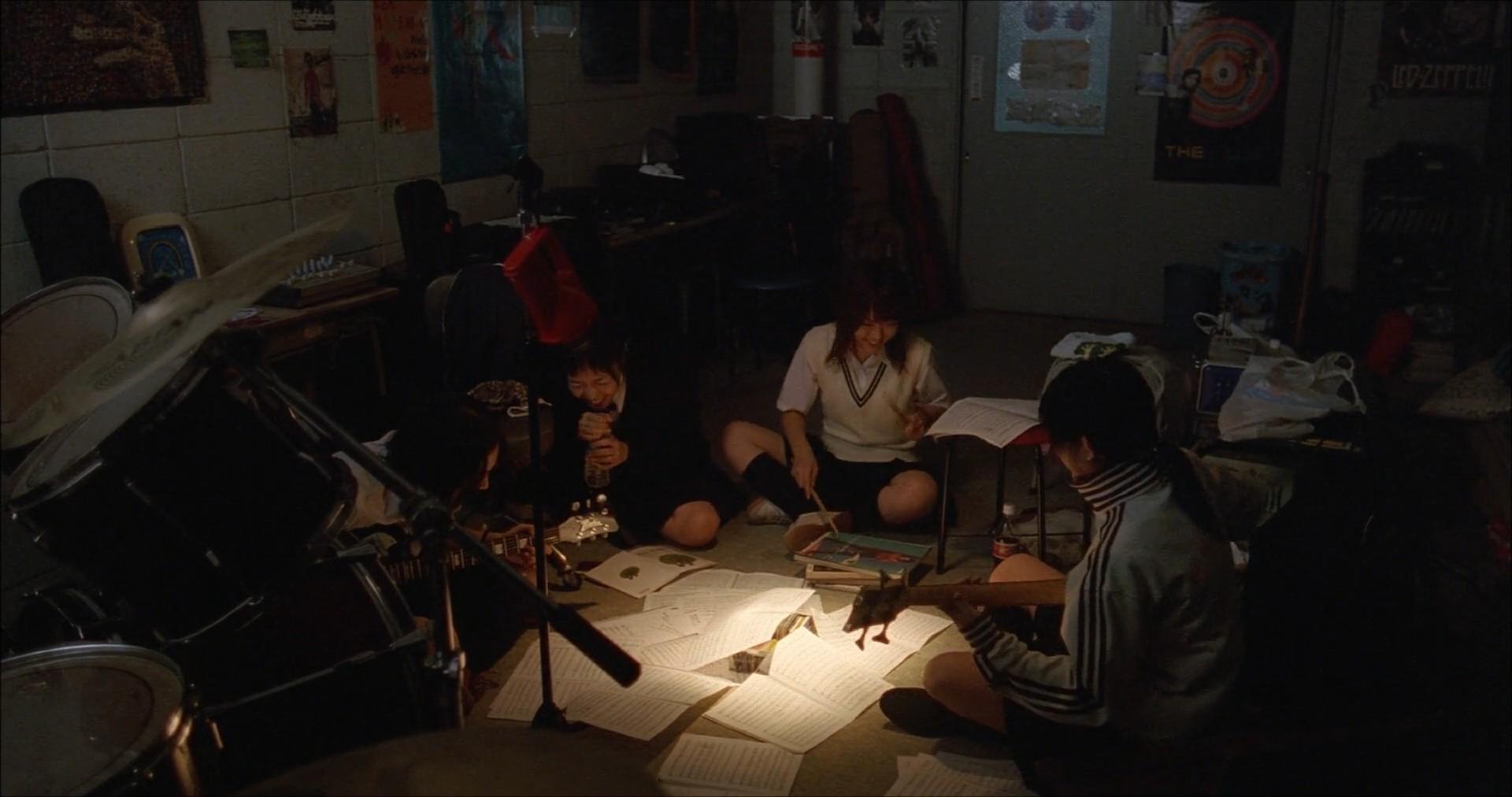 The band doing silent practice in the school after hours.