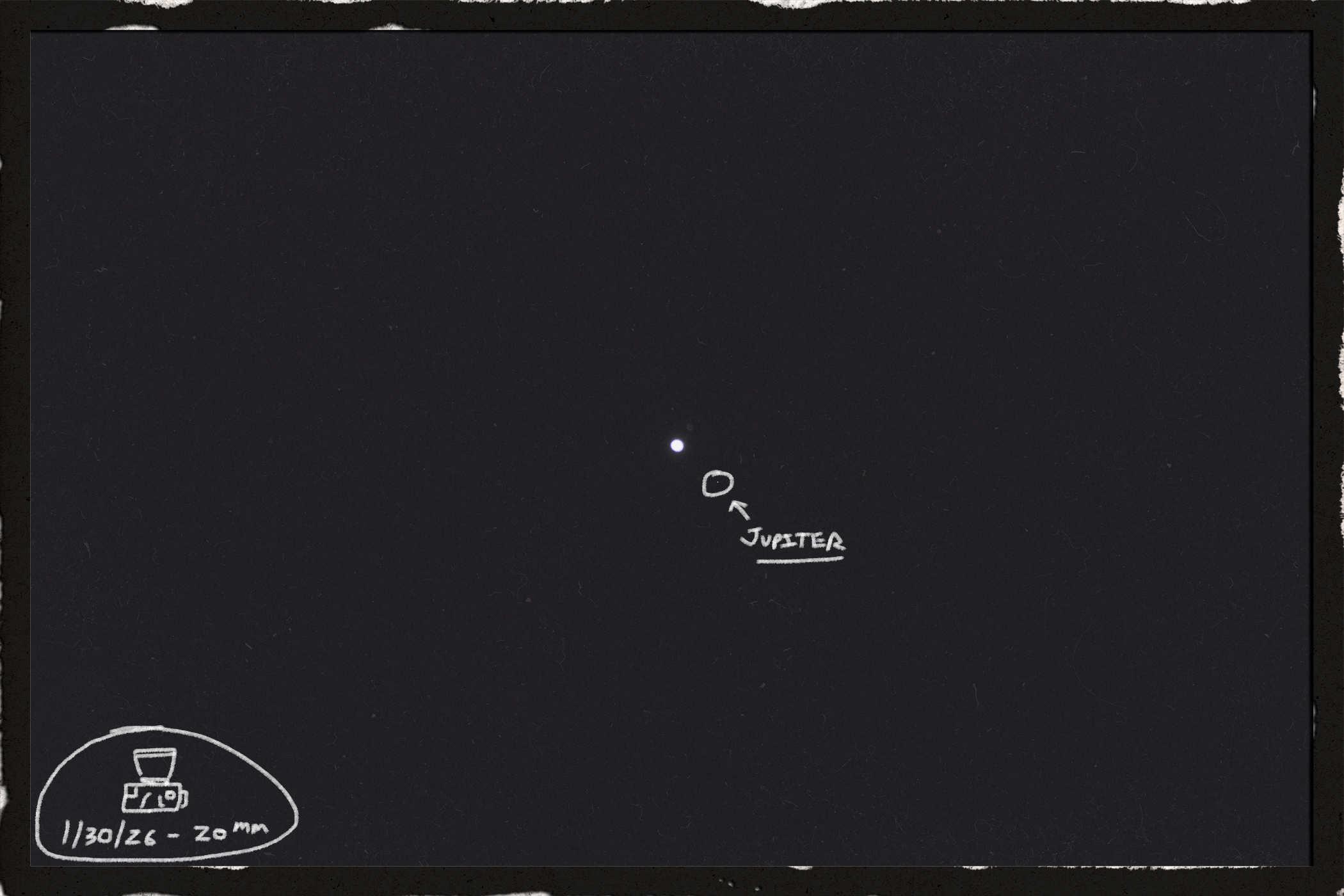 Photo of a white dot with a smaller white dot to the right - handwritten in the lower left of the frame is '01/30/26 20mm' with a badly drawn camera, and the smaller dot is circled with the word 'Jupier' written 