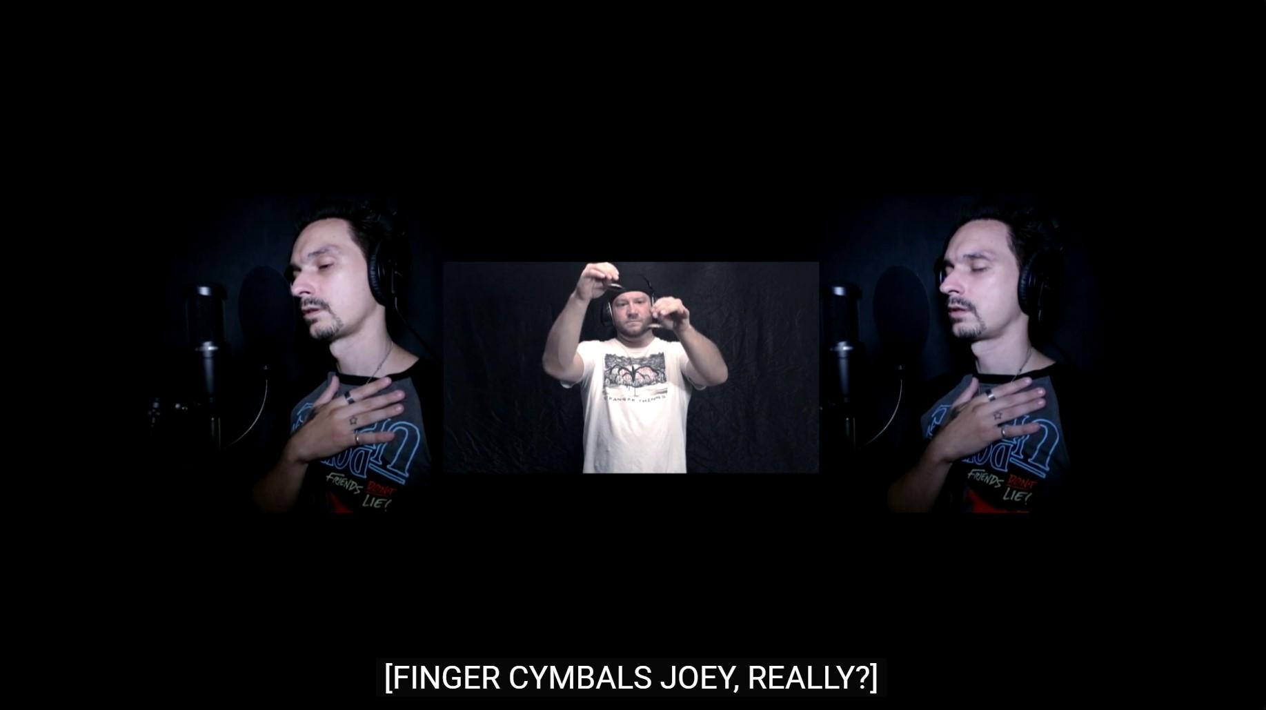 Still from 'You Need Better Friends' - two frames of me singing with Joey in the middle holding up finger cymbals; the closed caption reads [FINGER CYMBALS JOEY, REALLY?]