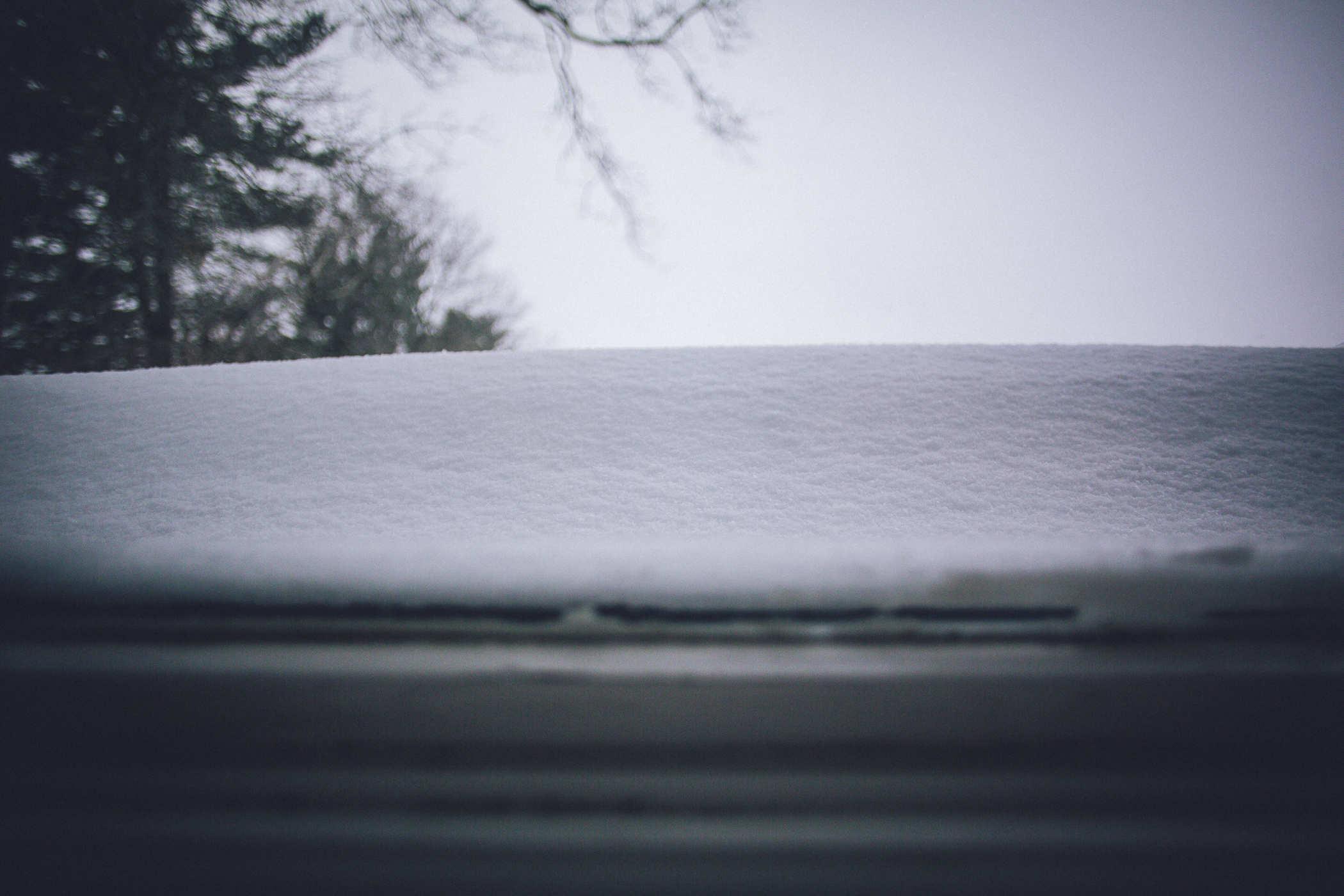 a door unable to open because snow is blocking it