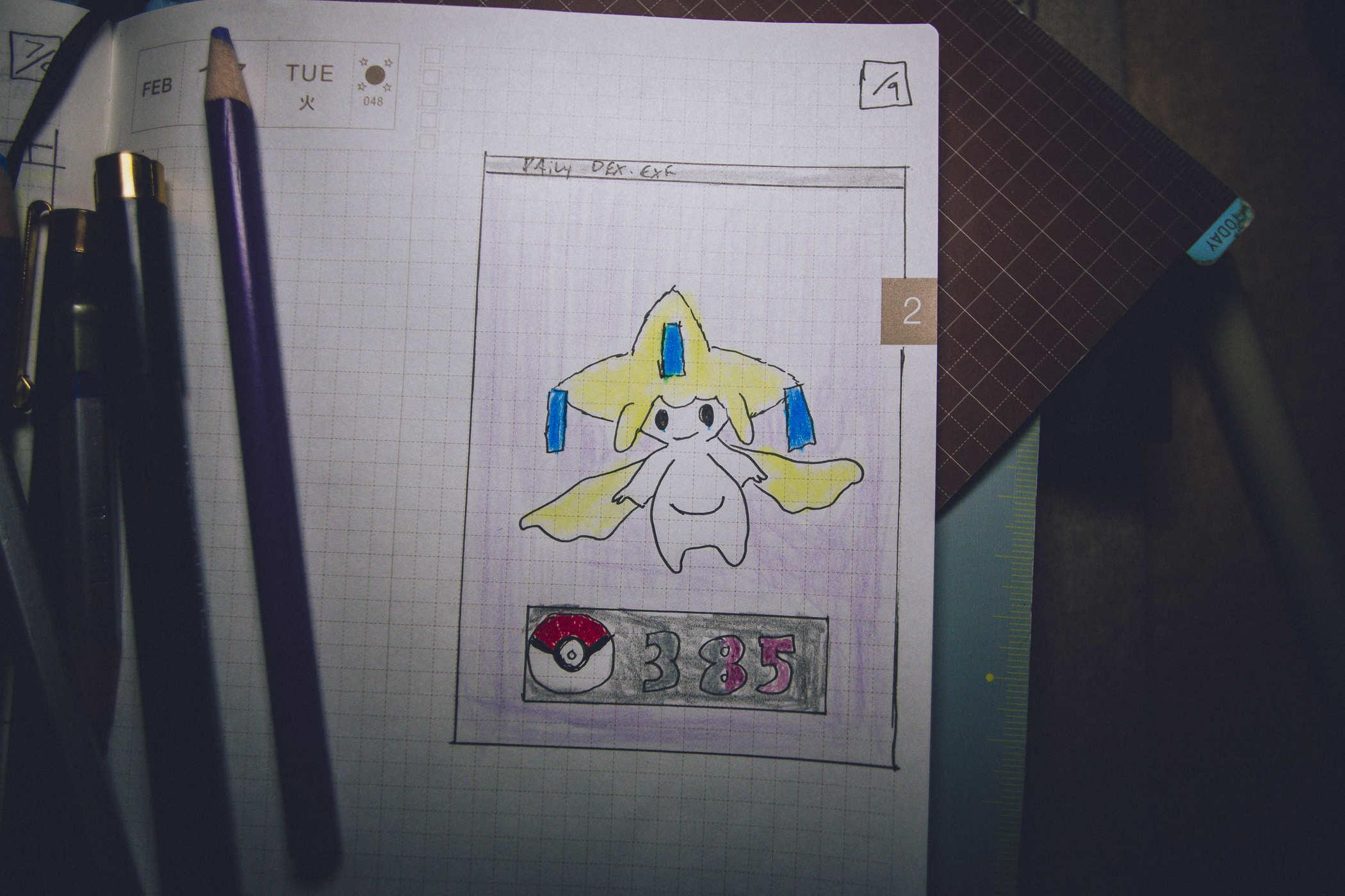 Drawing of pokemon 385; a small star-like figure