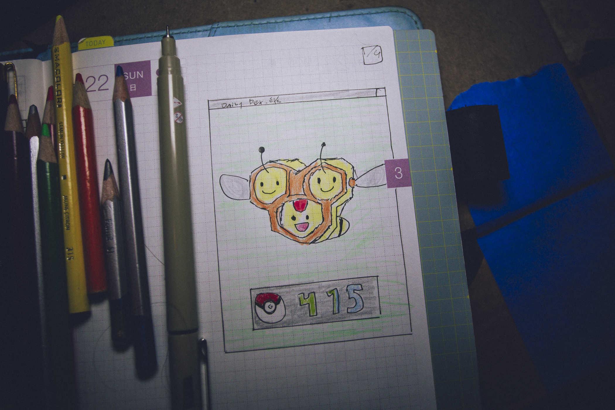 Drawing of pokemon 415; a triad of honeycomb with smiley faces in the center and wings on the side, giving the impression that it's three bees connected somehow