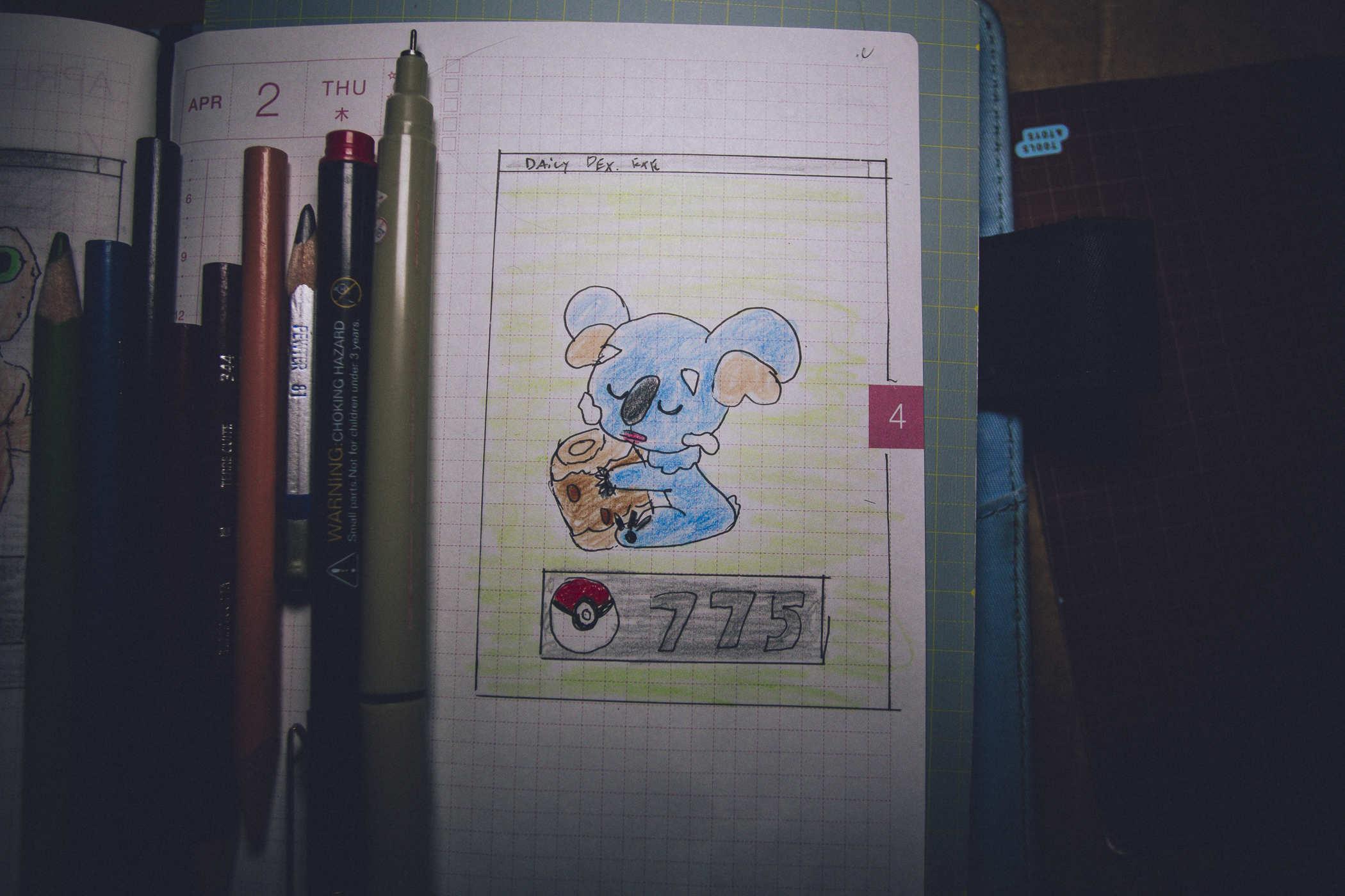 Drawing of pokemon 775; a blue koala sleeping on a chunk of wood 