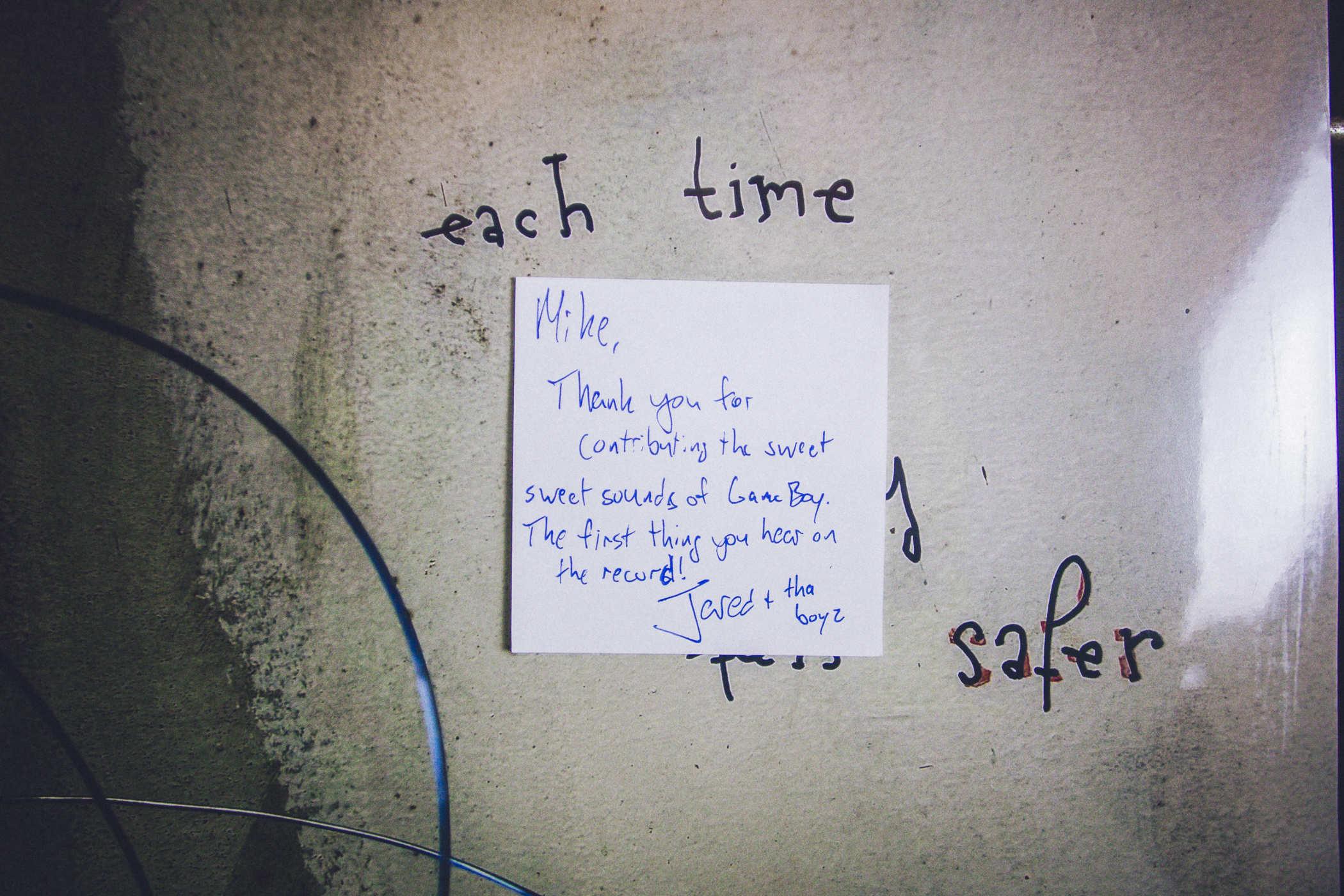 close-up of the post-it note attached to the cover - it reads 'Mike, Thank you for contributing the sweet sounds of GameBoy, the first thing you hear on the record!' - Jared + tha boyz