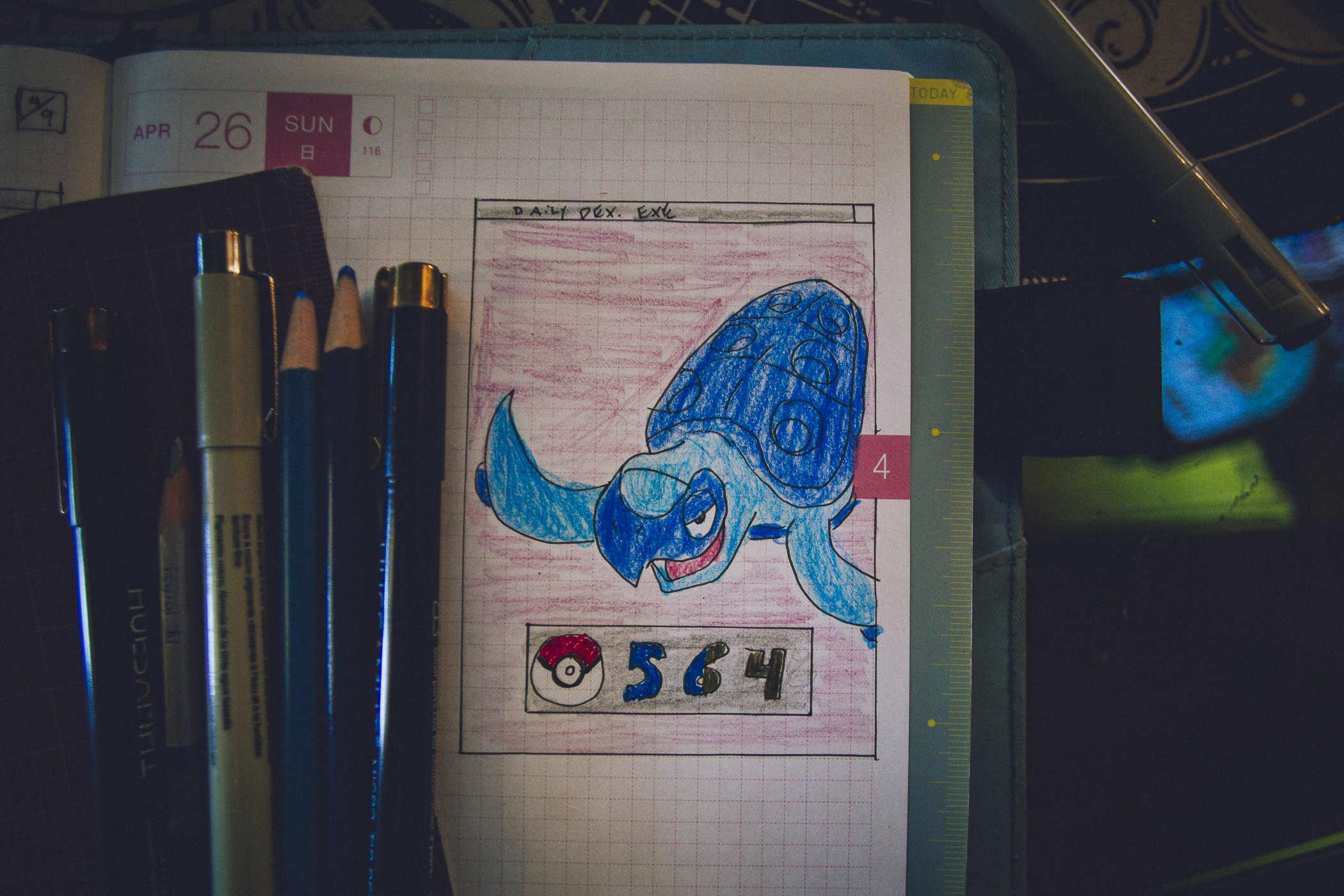 Drawing of pokemon 564; an also-stoned looking blue sea turtle