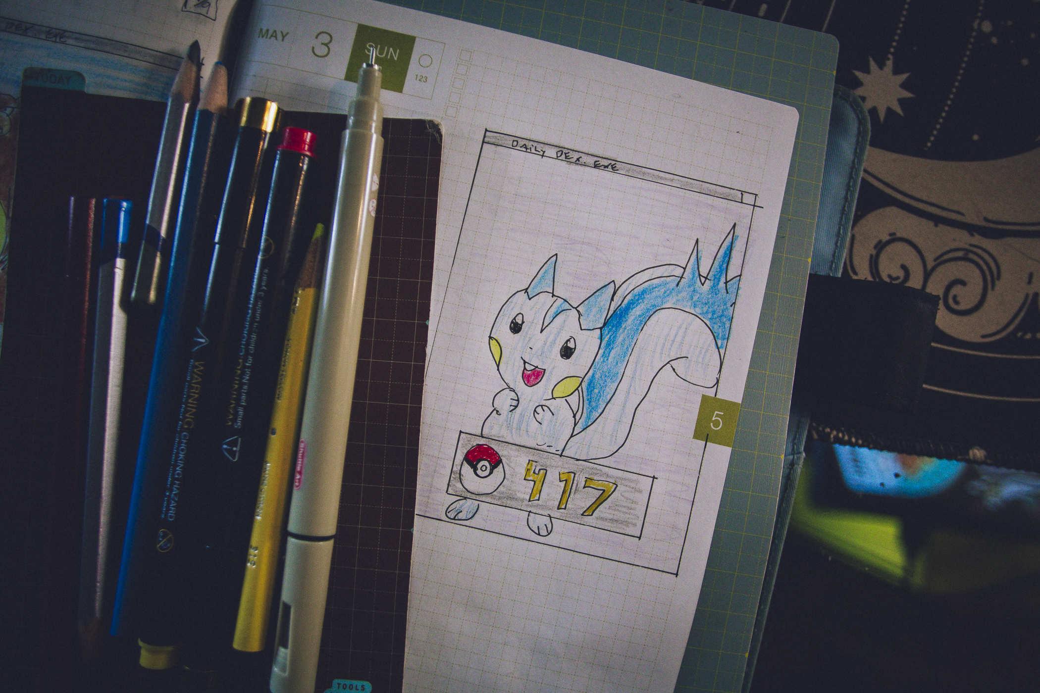 Drawing of pokemon 417; a mostly light blue squirrel with yellow cheeks