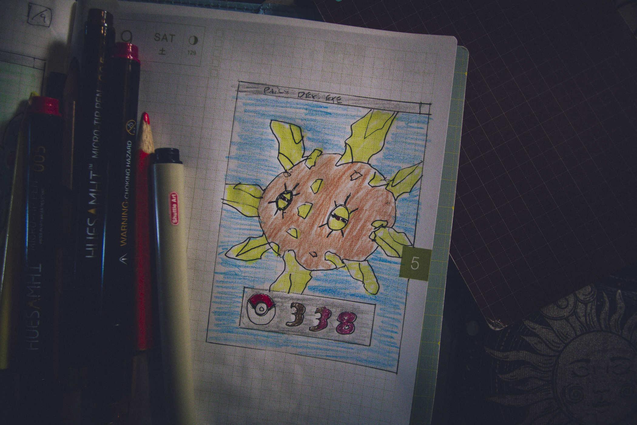Drawing of pokemon 338; a creature that looks like the sun but also rocks