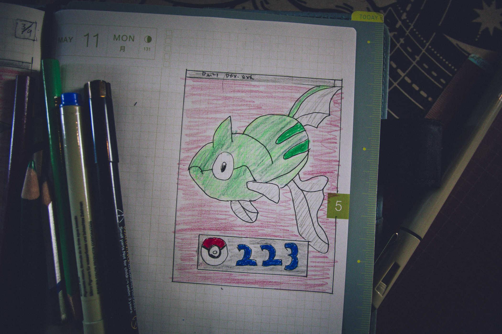 Drawing of pokemon 223; a greenish fish with large eyes