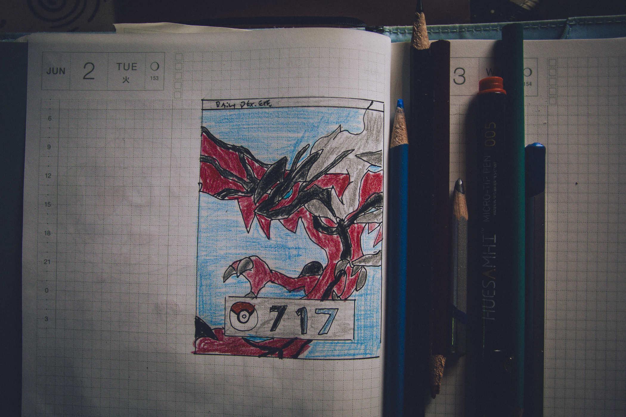 Drawing of pokemon 717; a large red and black bat dragon monster