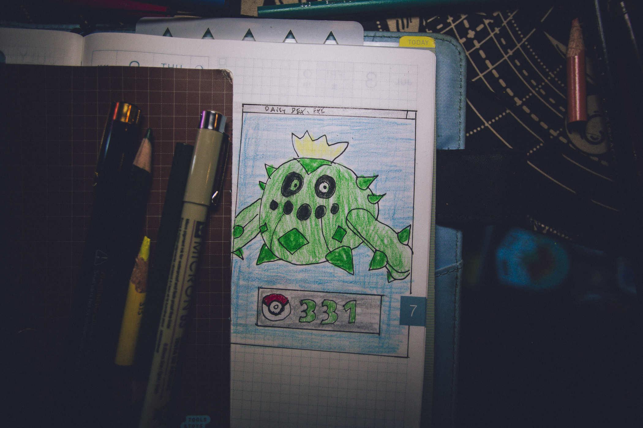 Drawing of pokemon 331; a round green cactus creature that has a yellow crown-like flower on its head