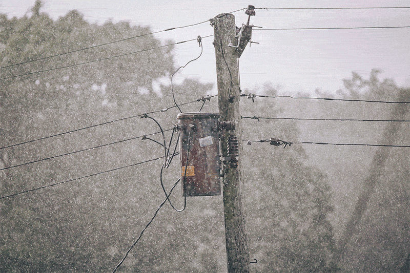 Animated gif of a utility pole getting pelted by rain