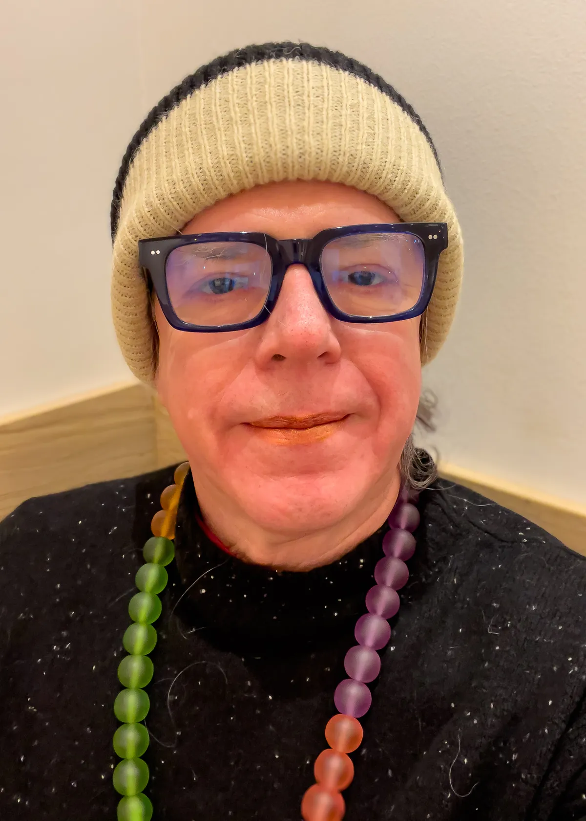 selfie with glasses, knit cap, necklace and lipstick 20251123-IMG_8788