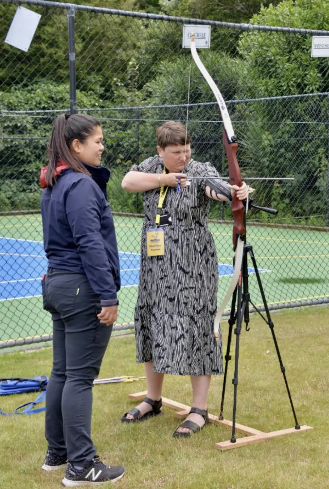 Sharlene lines up the arrow of her bow.
