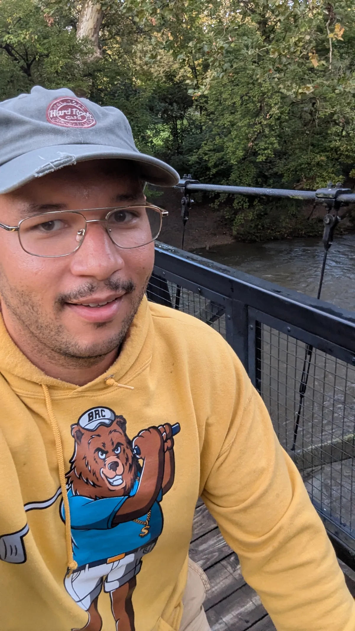 a man with a yellow sweatshirt
