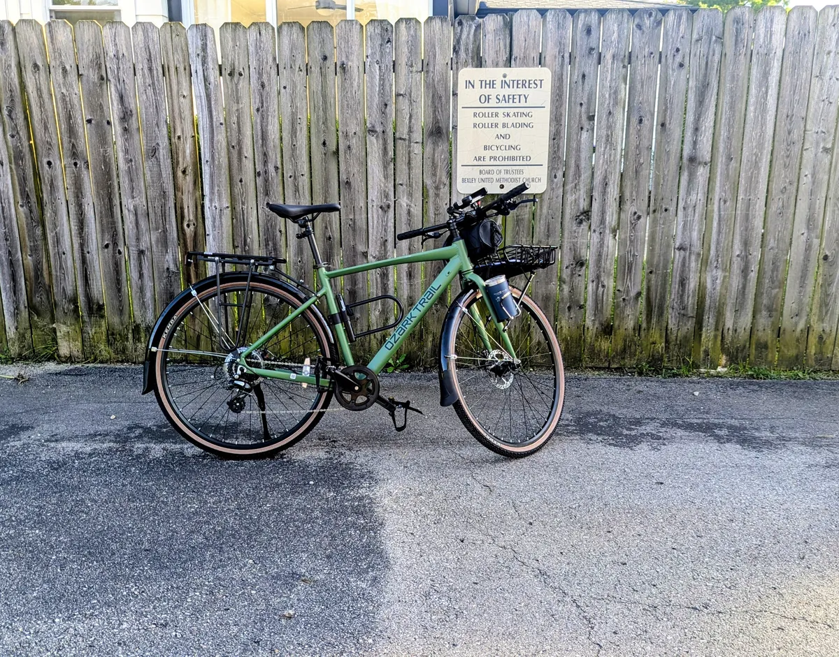 A photo of a green bicycle