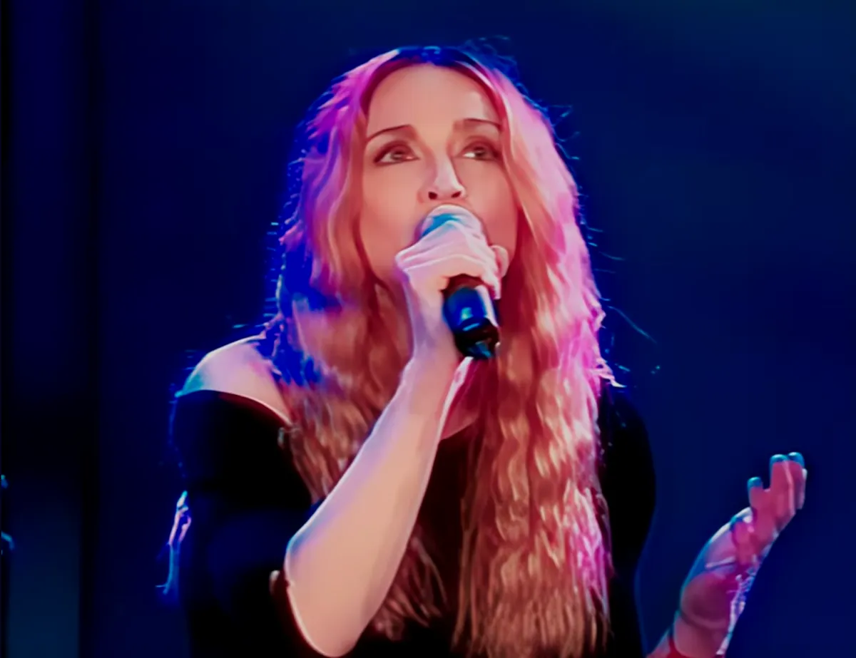 Madonna performing on The Oprah Winfrey Show in 1998