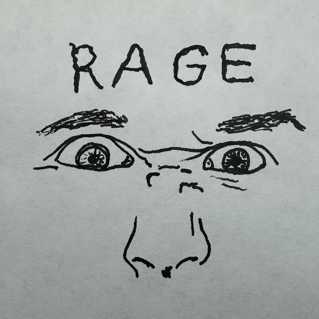 A white piece of paper with a hand-drawn picture of angry eyes in black ink. Above the eyes is the word 'Rage' written in with writing.