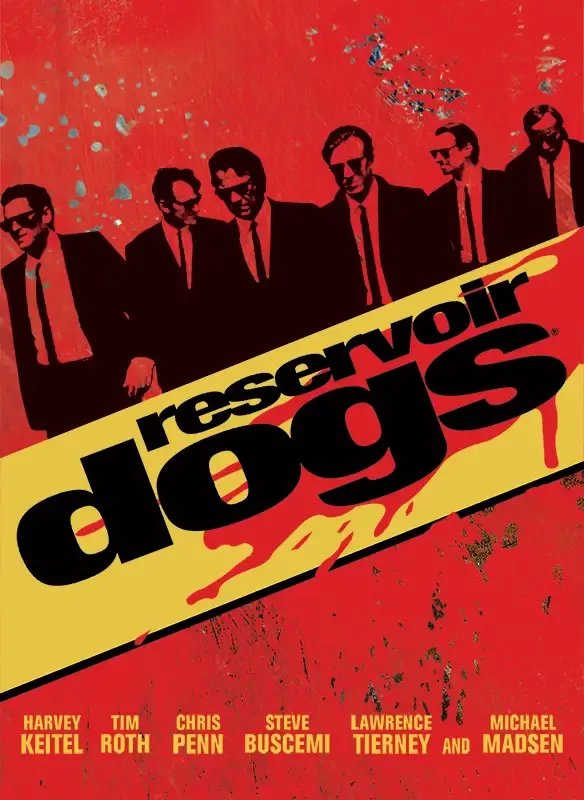 Mehrere Männer in Anzügen gehen vor einem roten Hintergrund mit dem Schriftzug Reservoir Dogs.