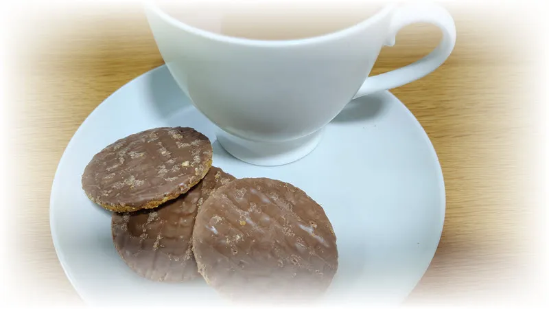 cup of tea and three biscuits